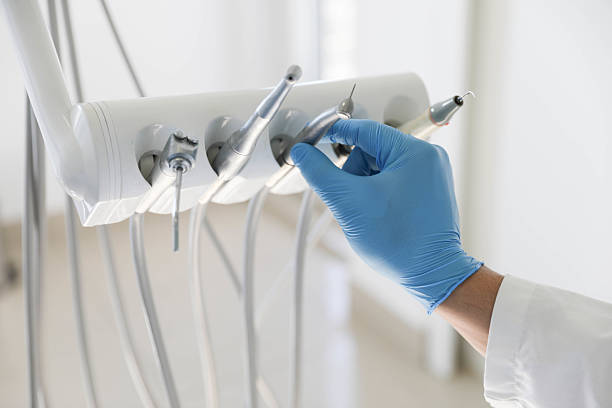 Professional Tooth Extraction technician working in Albemarle County County, VA